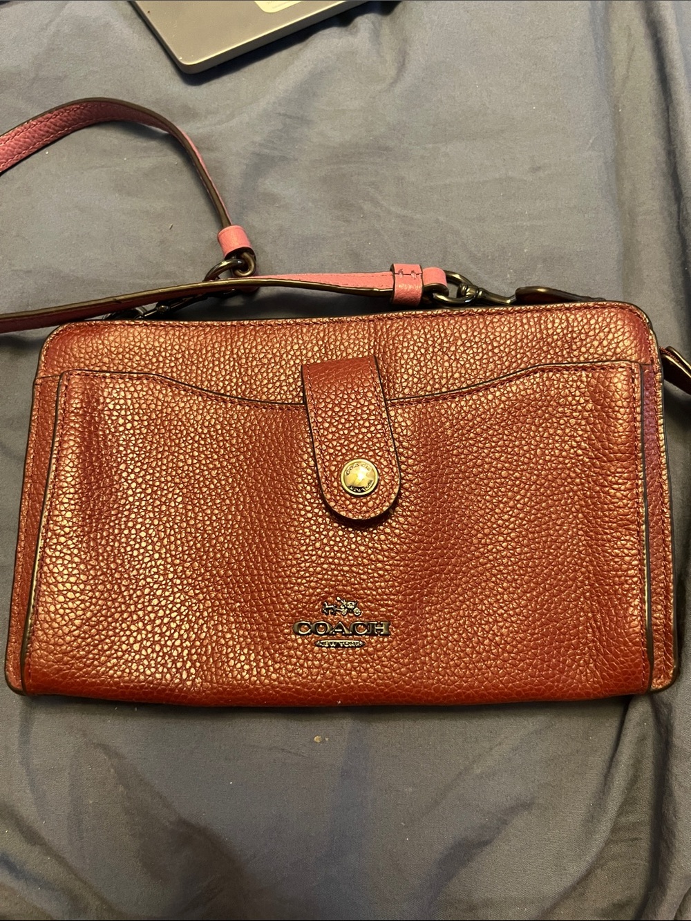 Coach Pebbled Leather Crossbody in Rust with Pink Strap Accent
